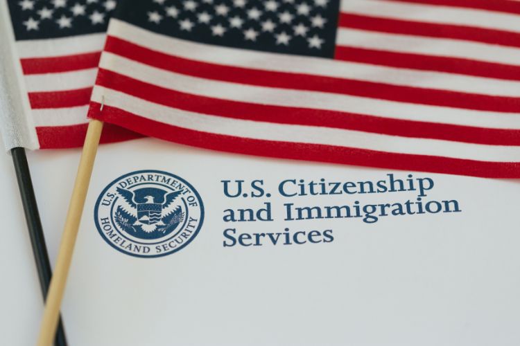 US flags and citizenship and immigration paperwork