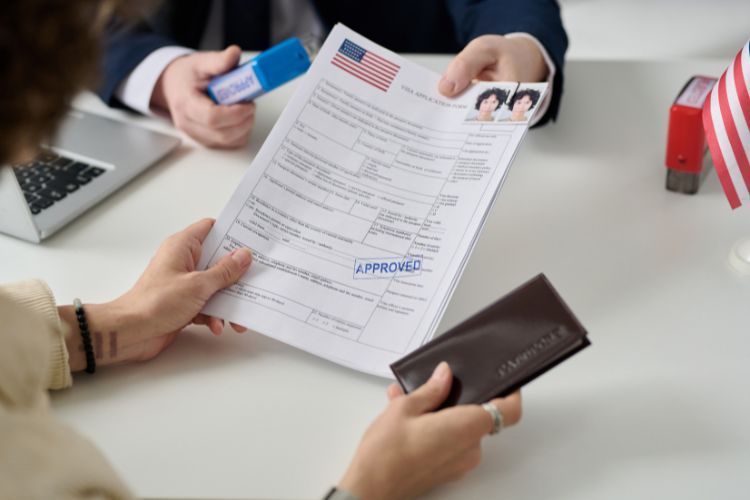 Woman getting US visa in immigration office